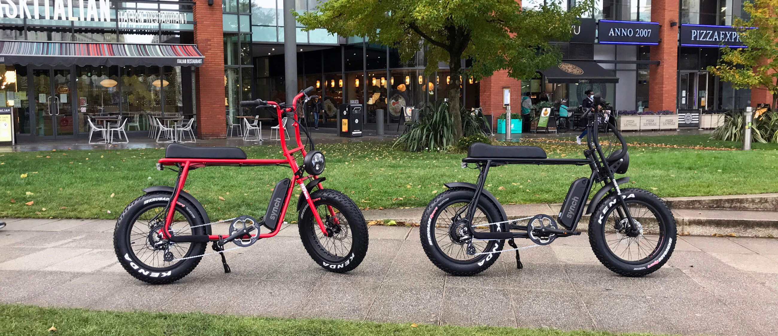 Synch ebikes in Picadilly Gardens, Manchester outside Pizza Express